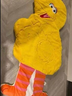 Sesame Street Plush Slip on Blanket in Yellow with Orange and Pink Accents